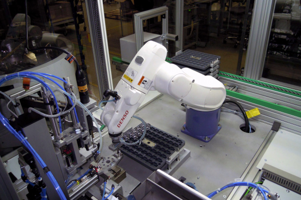 Controlling a machine for completing the cooler + electronic component assembly